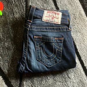 Size 25; Dark wash True Religion jeans that have been slightly worn!